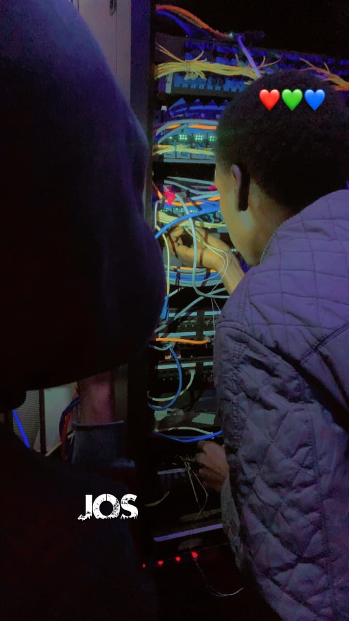 Vexel team working on a structured network rack in Jos